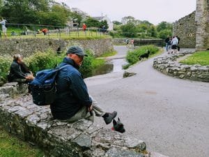Sitting with our dog in St David's City Cathedral grounds